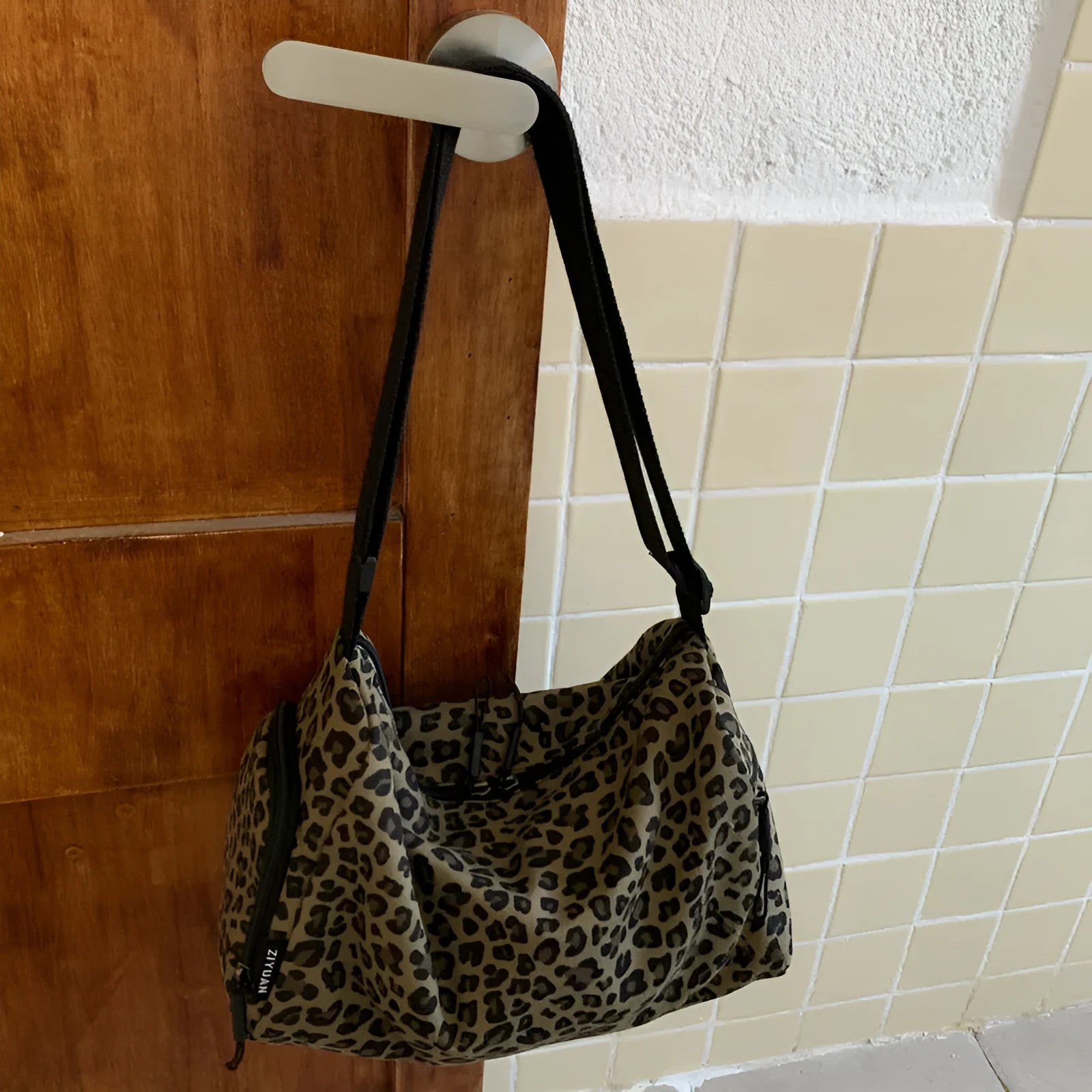 Leopard print sports style messenger shoulder bag with large capacity and cross-body strap