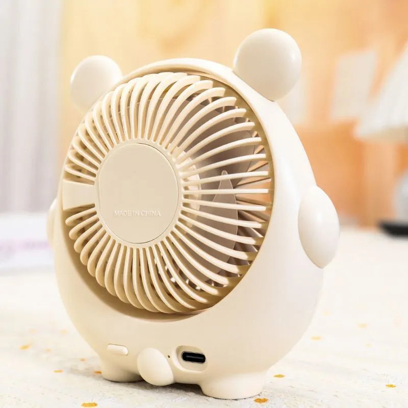 Fashion Cute Dog Desktop Electric Fan in a chosen colour on a desk with USB cable.
