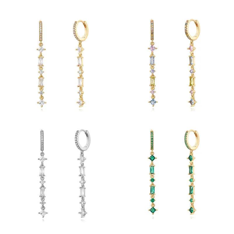 Women's gold-colour geometric U-shape ear clips with micro-inlaid colourful zircon stones and dot-ring-line pattern.