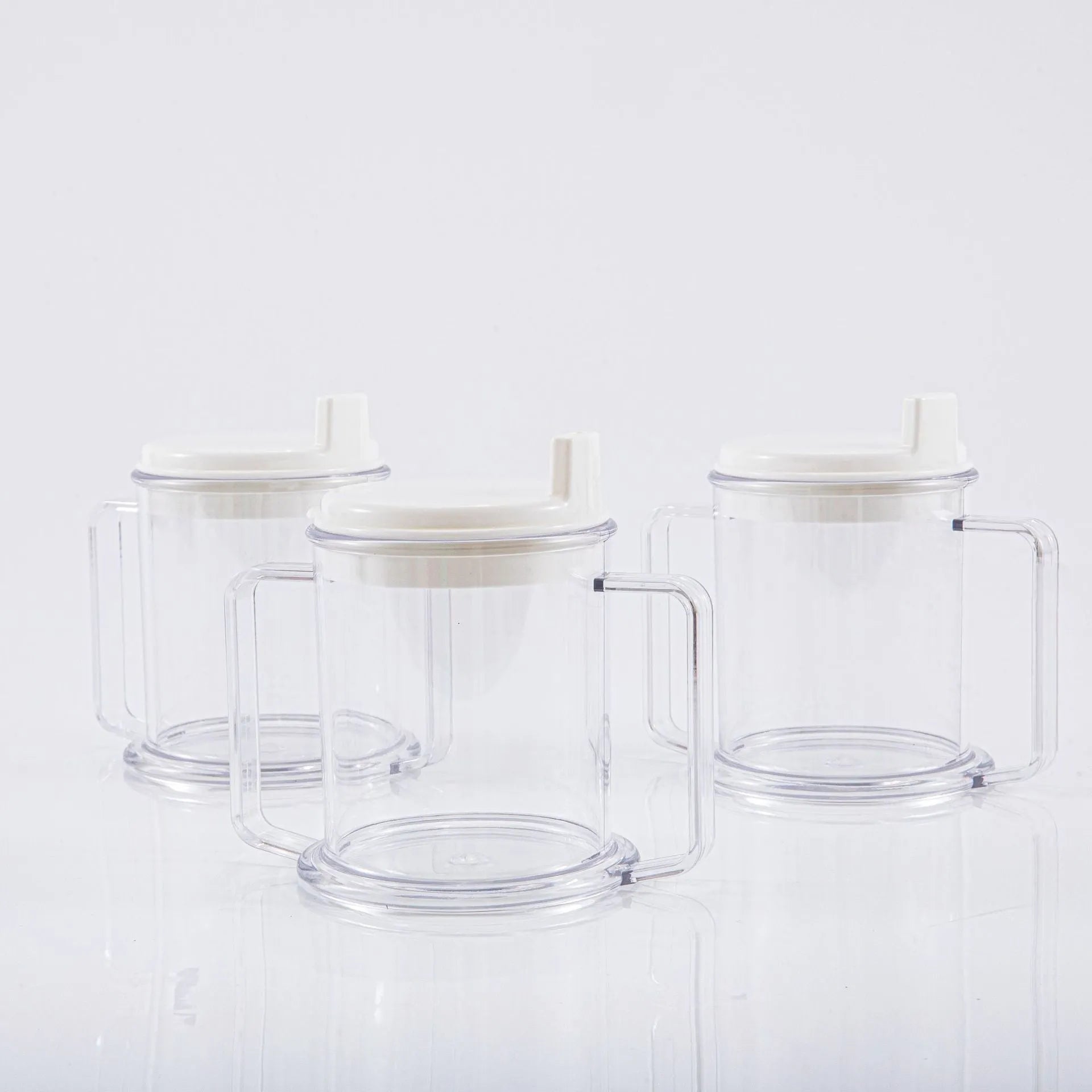 Transparent spill-proof drinking cup with modern design showing dimensions