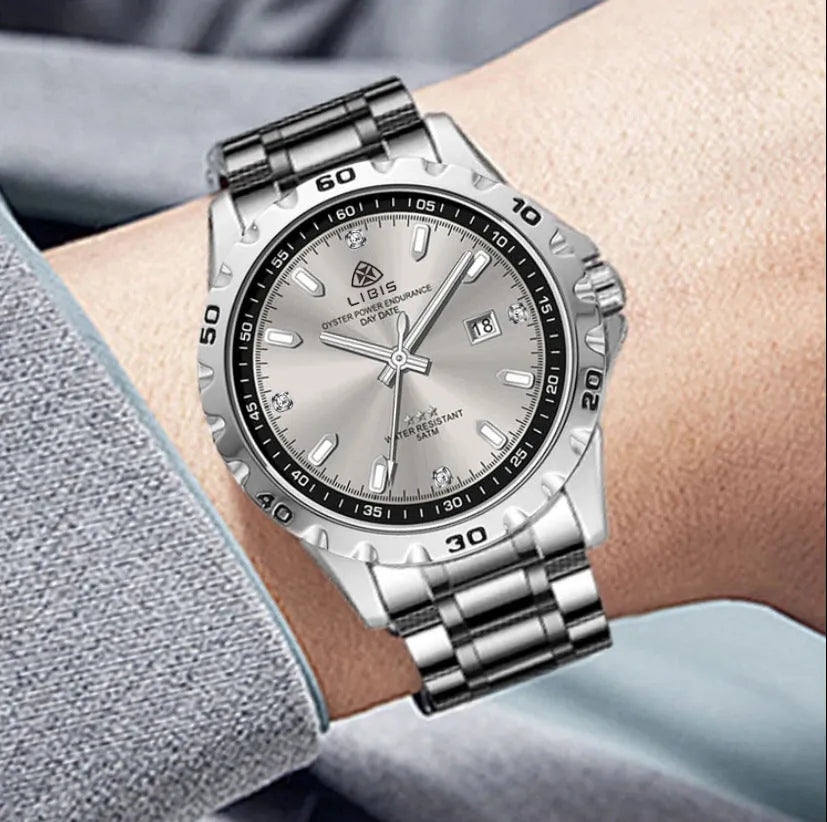 Men's silver business watch with luminous dial on stainless steel strap