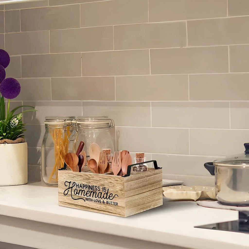 Wooden kitchen tableware storage box with grid dividers showing utensils organised in compartments