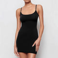 Black sling-style skinny sheath dress with sleeveless design and short skirt.