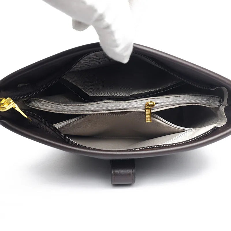 Korean style black bucket messenger bag with adjustable straps and multiple internal compartments