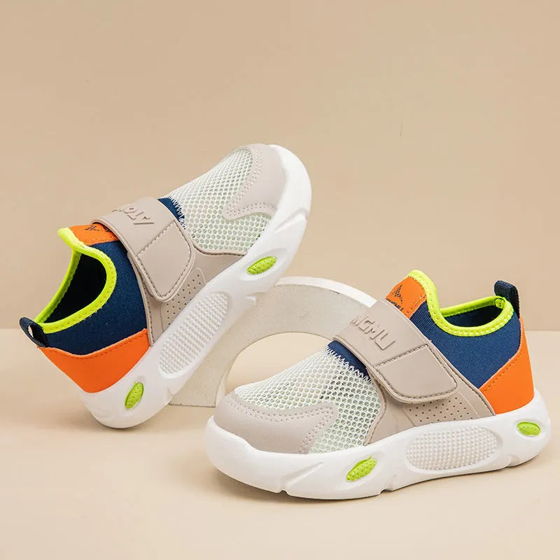 Children's slip-on shoes with soft rubber sole and PU upper in blue green colour on white background