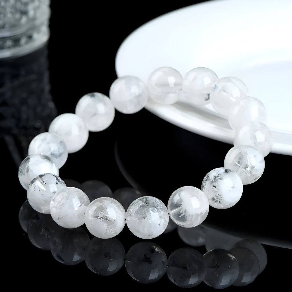 Women's natural blizzard crystal bracelet with geometric beads featuring Ruyi and Xiangyun design.