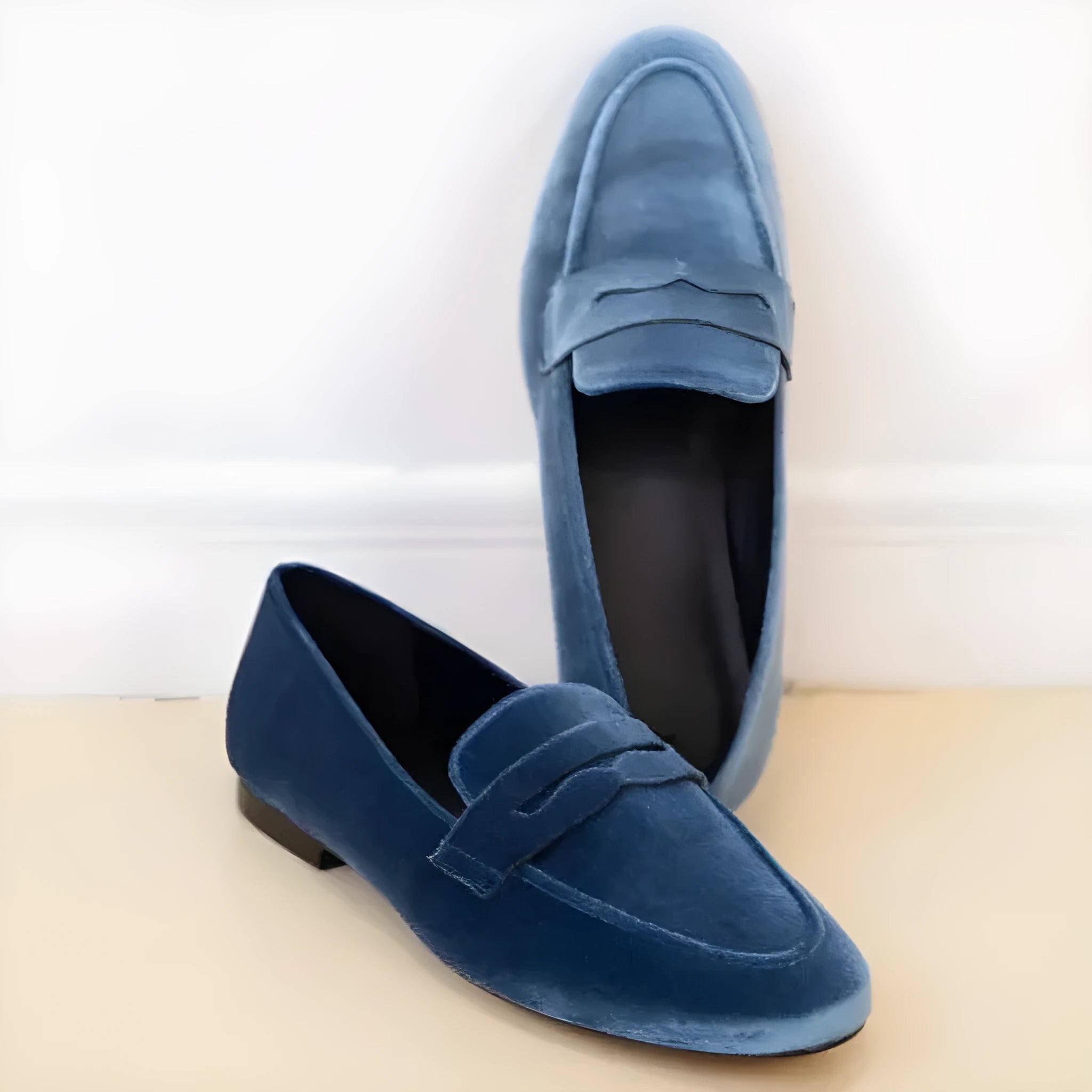 Blue leisure loafers with black rubber sole and artificial PU upper in round toe design