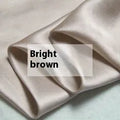 Pure silk duvet cover in a solid colour, showing texture and available in multiple size options.