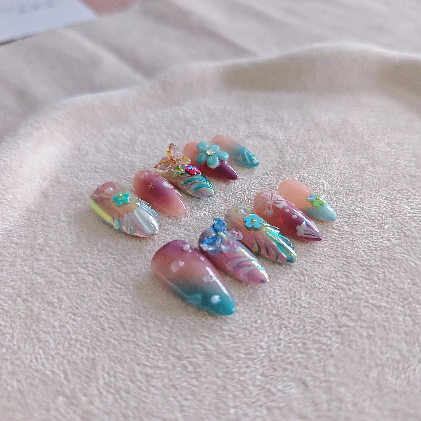Handmade colourful butterfly wear manicure sculpture with floral patterns and embossed details