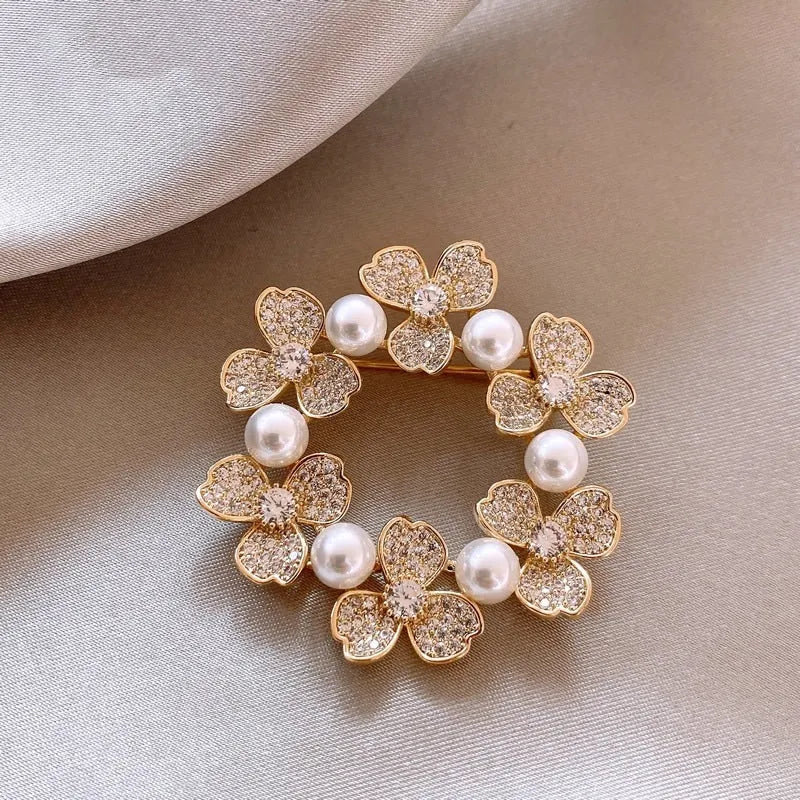 Alloy brooch in natural flower shape with electroplated finish, featuring adjustable and anti-exposure pin closure for women's coats and suits.