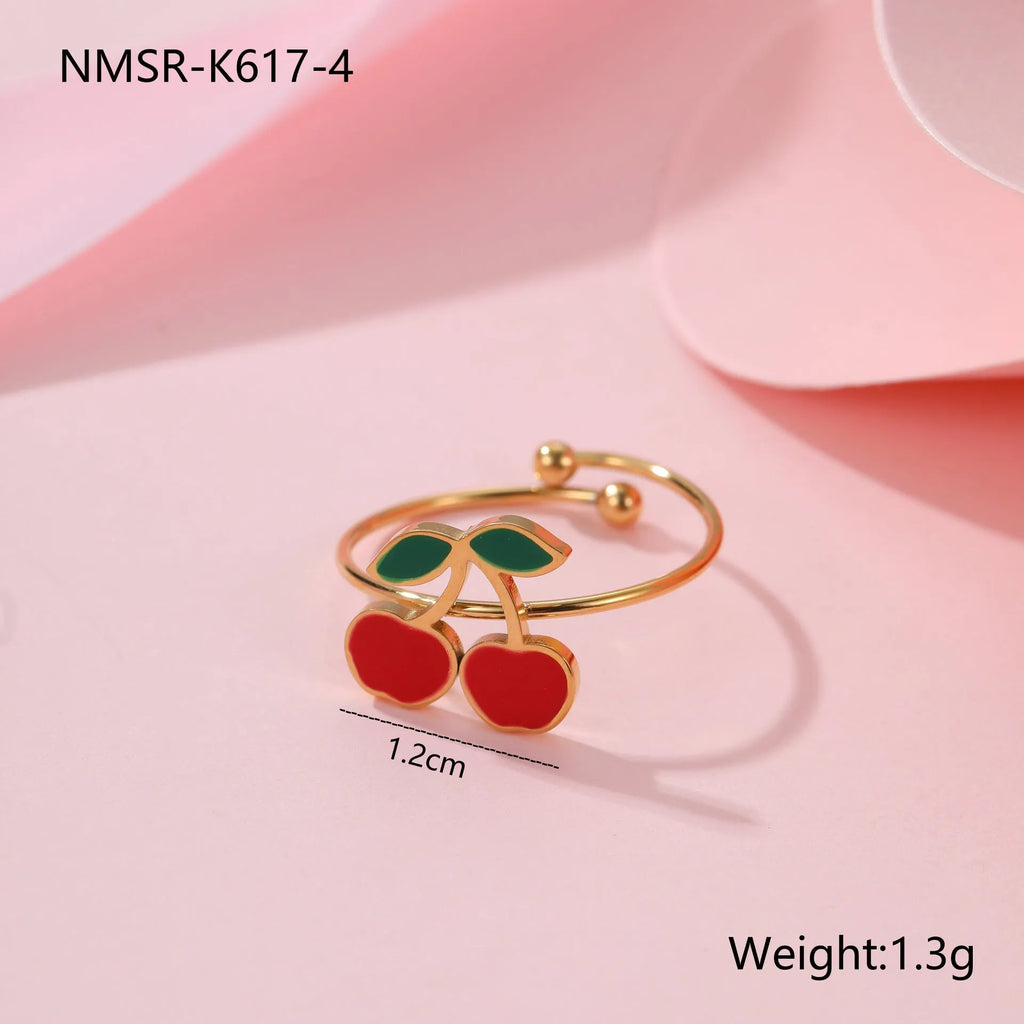 Cherry jewellery set showing necklace, bracelet, earrings, and ring with 18K gold electroplating on stainless steel