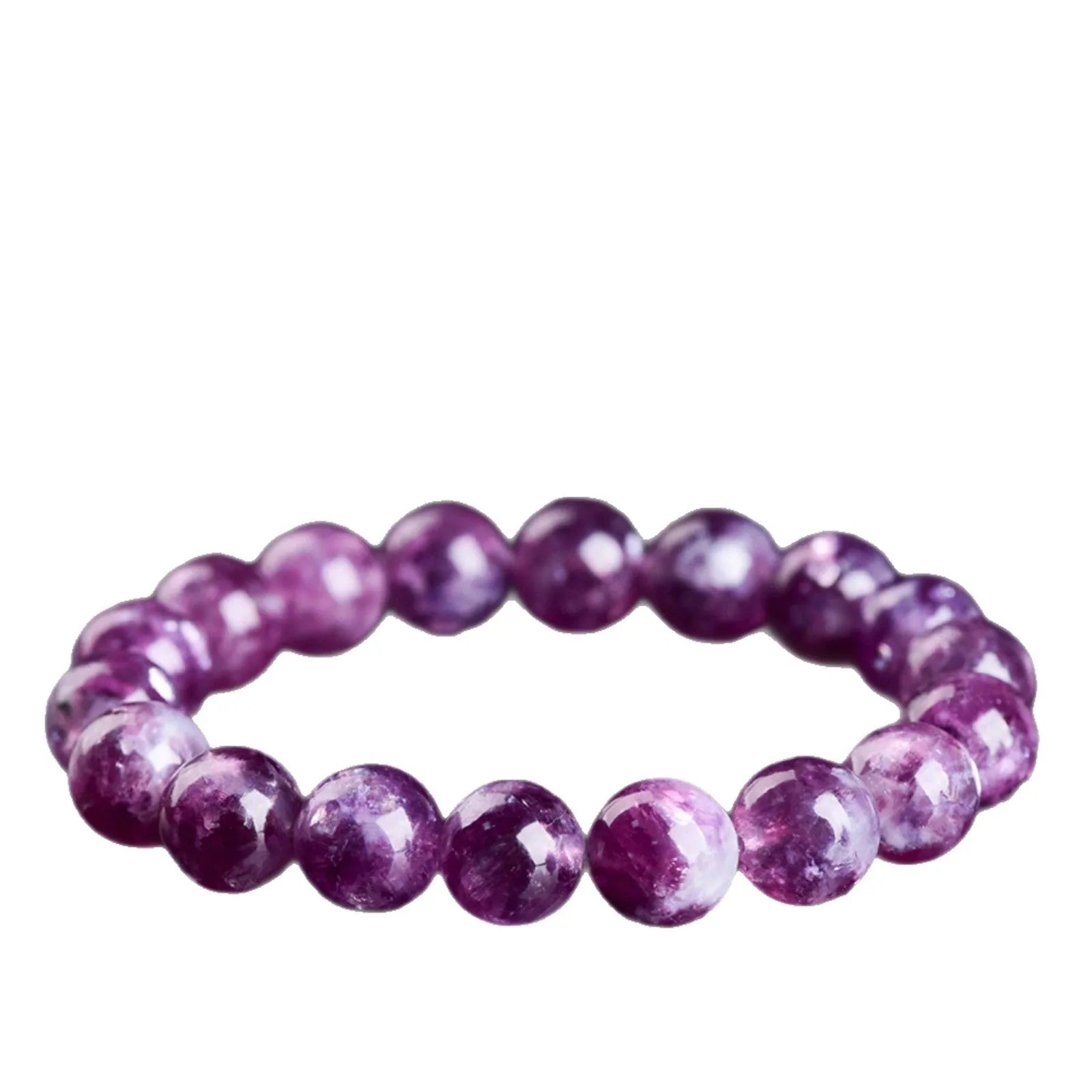 Purple polished crystal beaded bracelet with geometric beads on a white background.