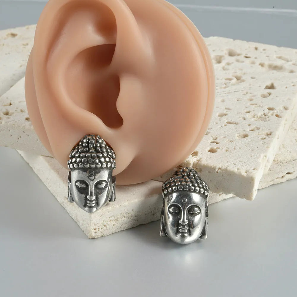 Stainless steel hollow skull Buddha earrings showing geometry shape and electroplated colour options