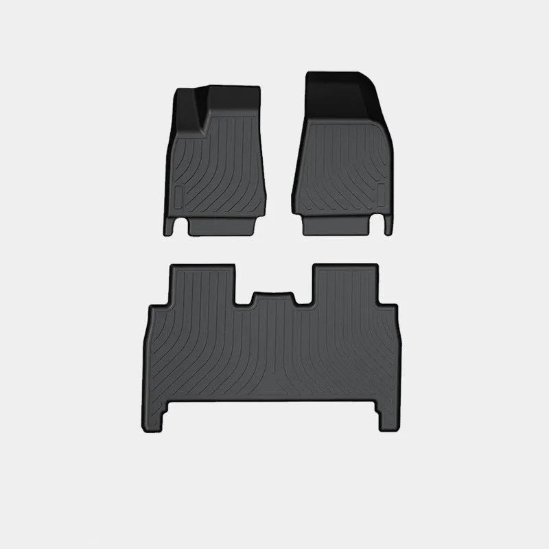 Rubber floor mat set for Tesla Model X showing foot pads and tailbox cushion for interior protection