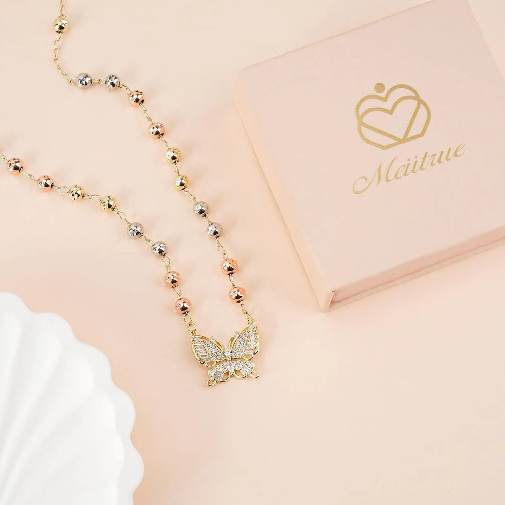 Gold butterfly necklace with zircon inlay on adjustable stainless steel chain, simple bow design for women