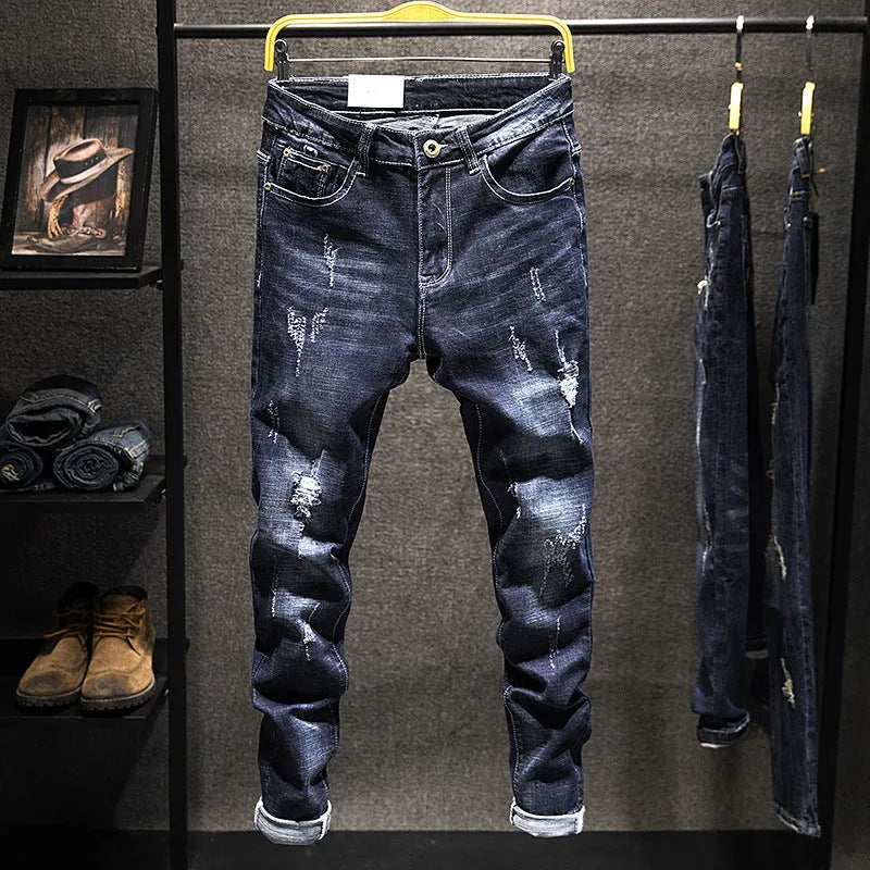 Men's slim-fitting skinny jeans in dark blue cotton denim with micro elasticity.