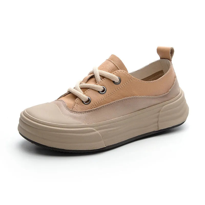 Women's leather platform sneakers in matcha green, showing lace-up front and round toe design.