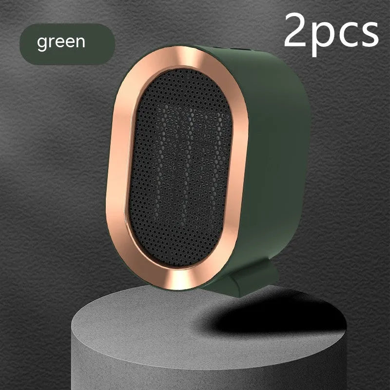 Desktop electric heater with cast metal housing and rotating air outlet in various colour options