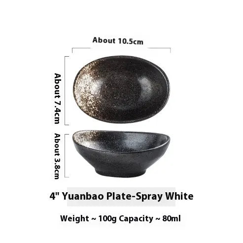 Oval Japanese ceramic sauce dipping bowl with underglaze finish on a table.