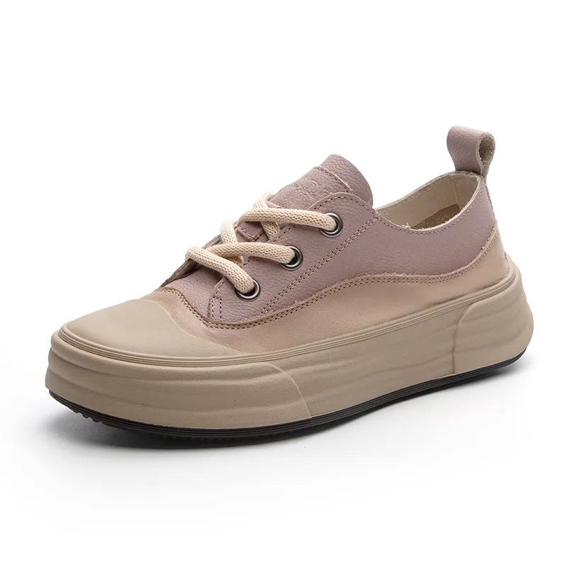 Women's leather platform sneakers in matcha green, showing lace-up front and round toe design.