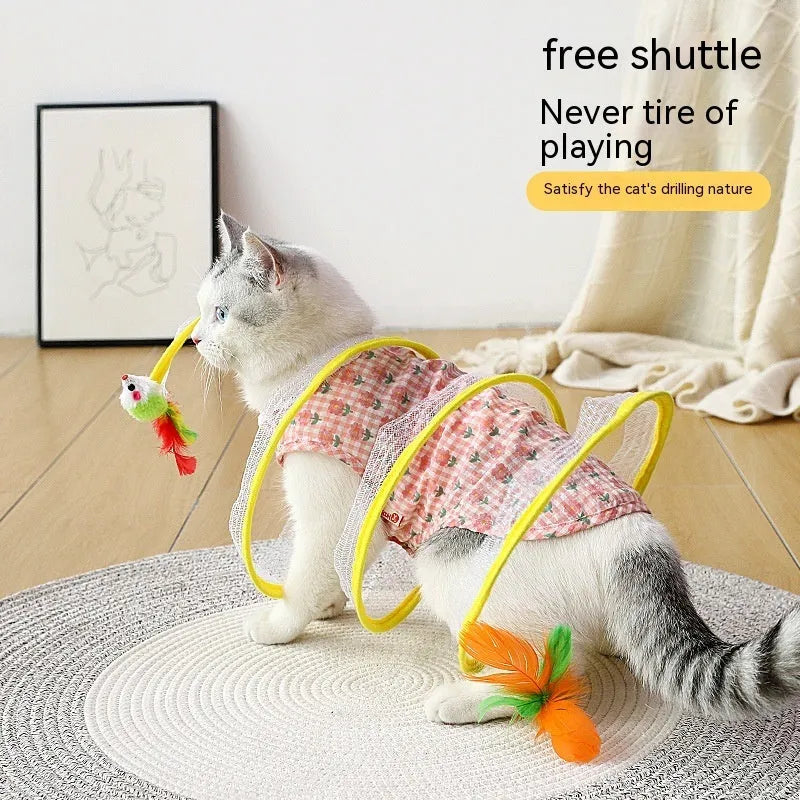 Folded cat tunnel S type in striped pattern with mouse and feather attachments on each end