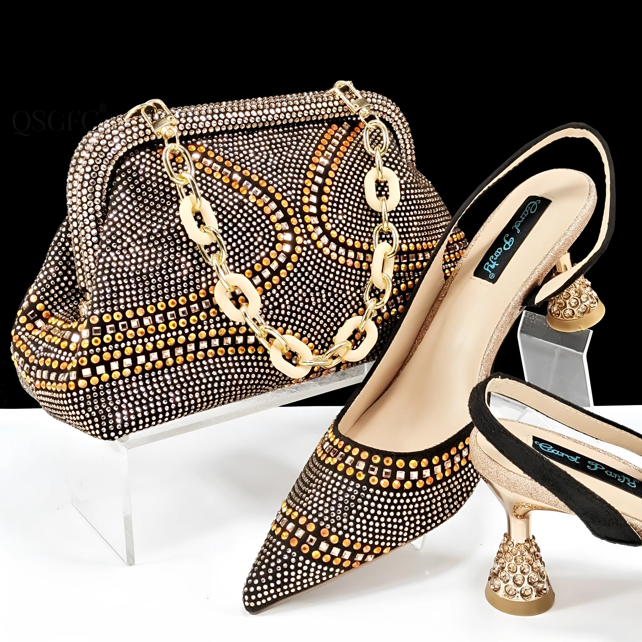 Women's pointed toe high heels with rhinestone details and matching small bag in synthetic leather