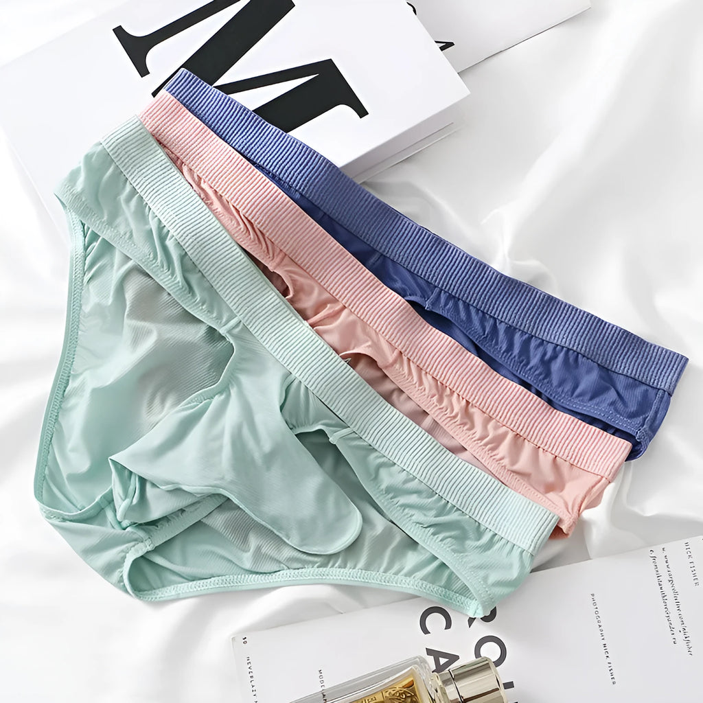 Men's low waist ice silk briefs in black, shown flat.