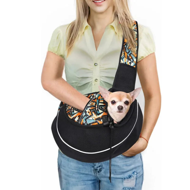 Women carrying black pet crossbody bag with small dog inside, Oxford material with drawstring closure