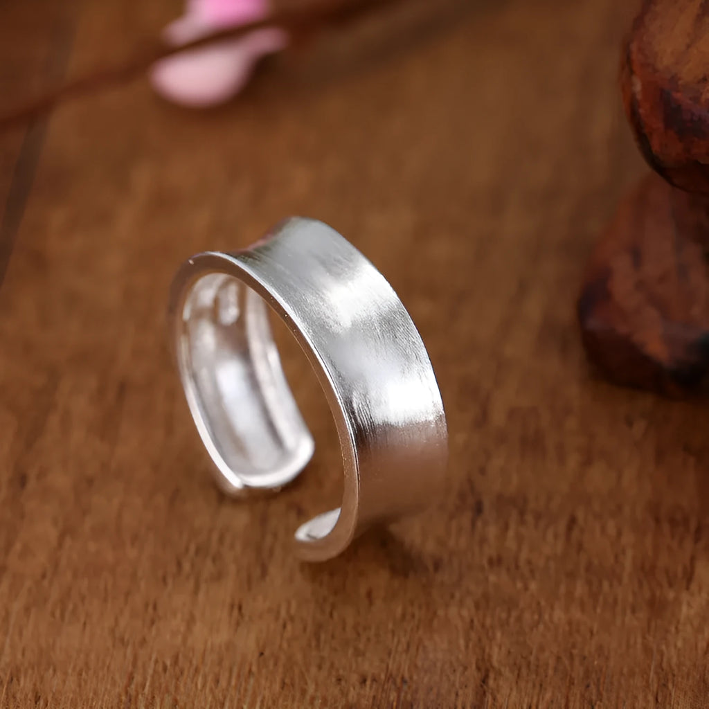 Geometric sterling silver ring with adjustable opening and frosted electroplated finish