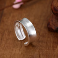 Geometric sterling silver ring with adjustable opening and frosted electroplated finish