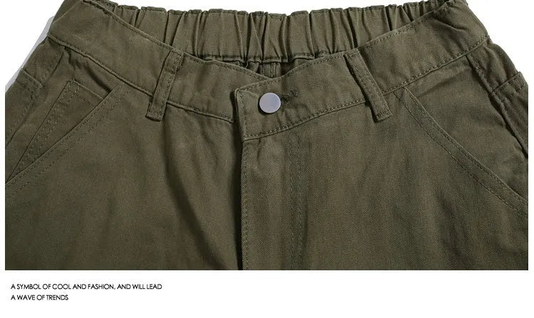 Casual wide-leg cropped shorts in apricot colour with mid waist and micro-elastic fabric.