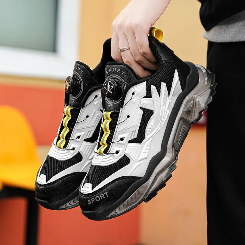 Men's black mesh sneakers with a rotating button on the side and a thick platform sole.