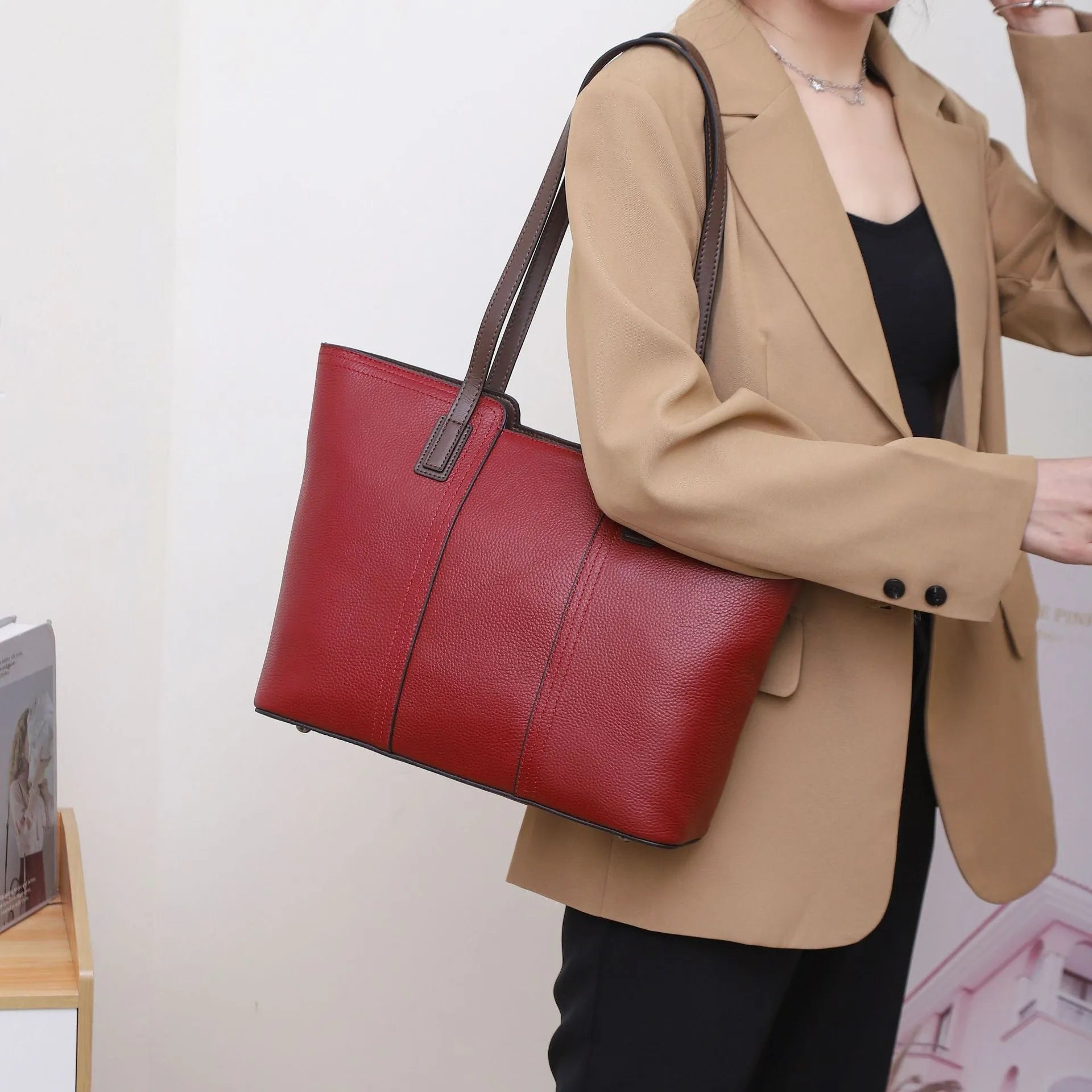Women's genuine leather commuter shoulder bag in khaki colour with sandwich pocket and internal organisation