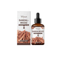 30ml amber glass bottle of sandalwood essential oil with a black dropper top.