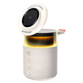 White three-in-one wireless magnetic Bluetooth charger with lighting on a household desk