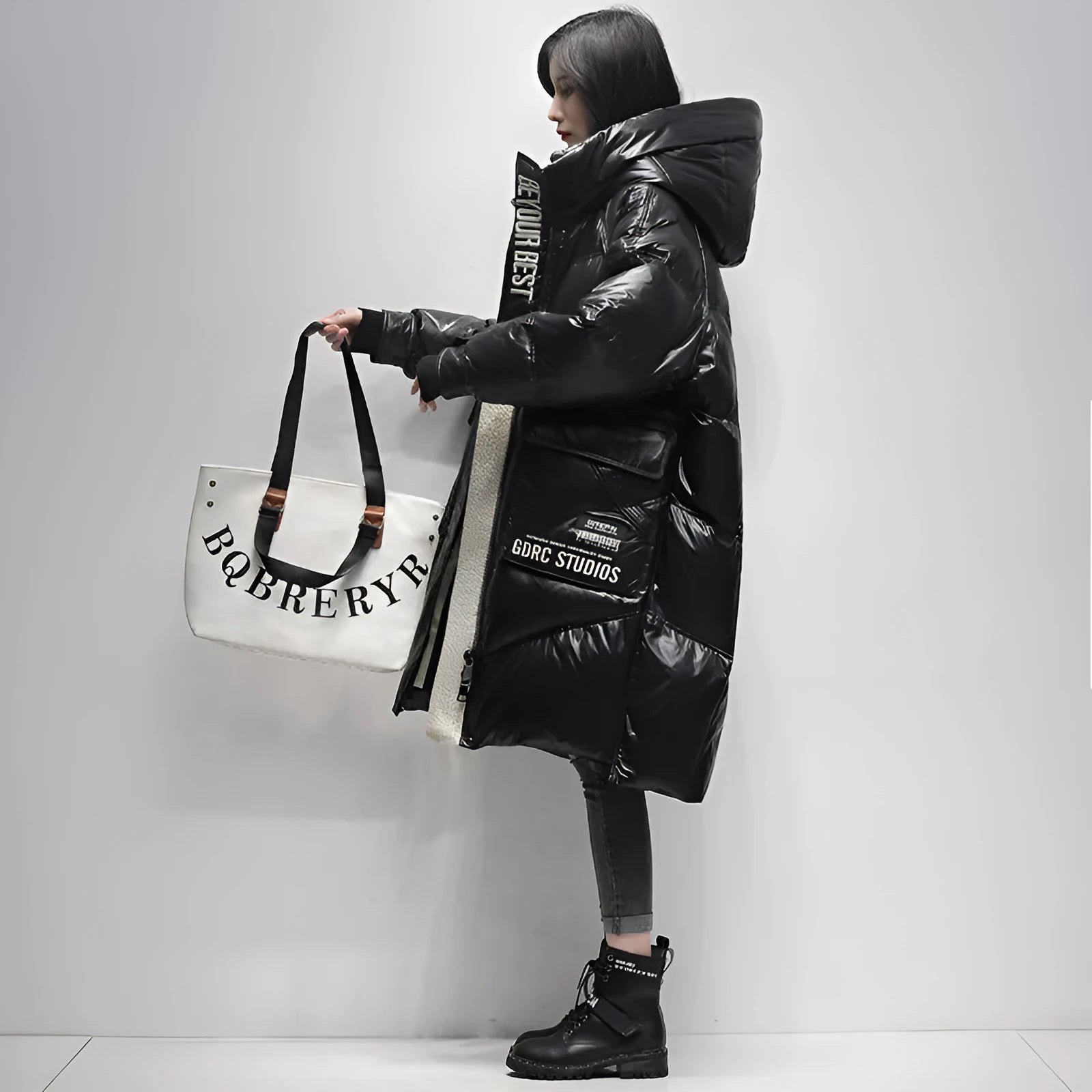 Women's ultra-thin mid-length down coat in black with long sleeves and loose fit, white duck down filling