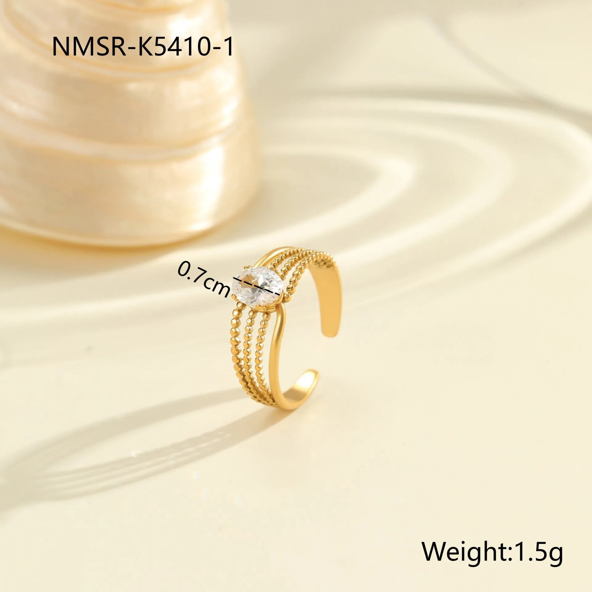 Stainless steel women's ring with gold electroplating and zircon details in geometry design