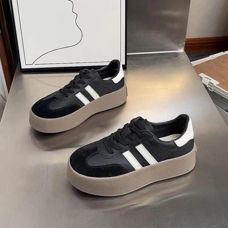 Women's vintage distressed leather sneakers with round toe and lace-up front