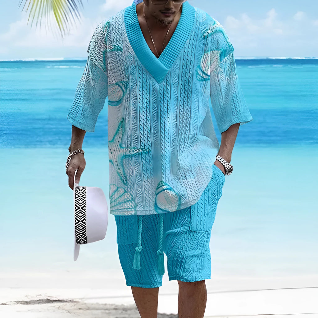 Man wearing a loose fit casual short sleeve top and matching shorts suit set