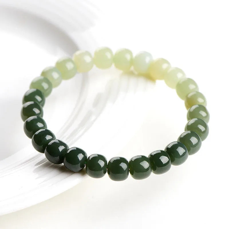 Natural Hetian jade bracelet with sunny water gradient colour on wrist
