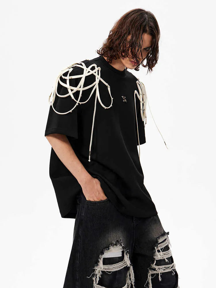 Black loose fit short sleeve T-shirt with padded shoulder and rivet ribbon detail
