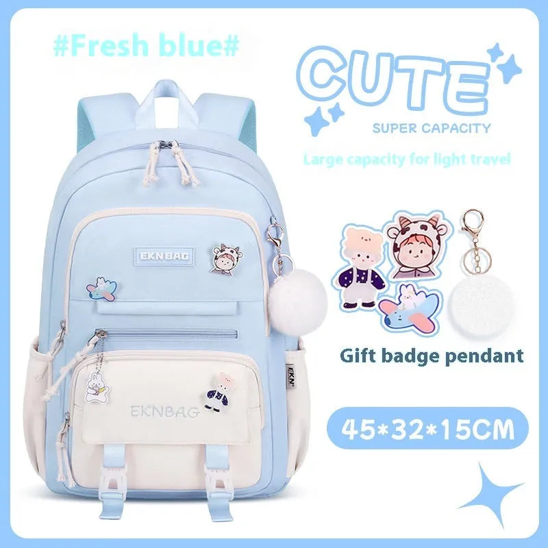 Pink waterproof Oxford cloth school backpack for girls with curved shoulder straps on a white background.