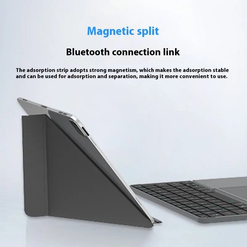 Grey folding Bluetooth keyboard with phone stand extended, showing compact folded size