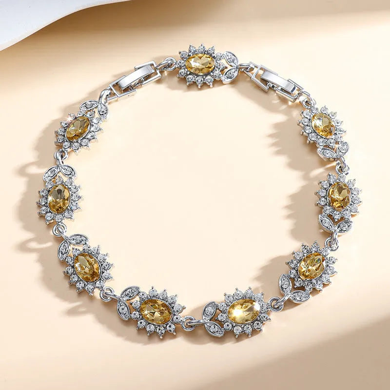 Women's zircon bracelet with electroplated finish in environmentally friendly alloy showing colour options