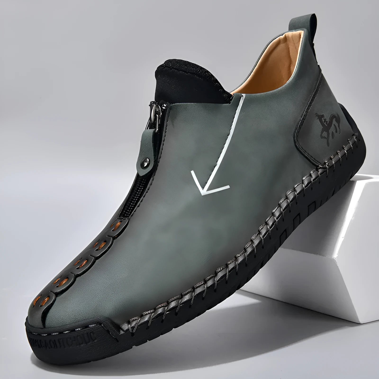Men's brown leather martin boots with front zipper and hand-stitched detailing