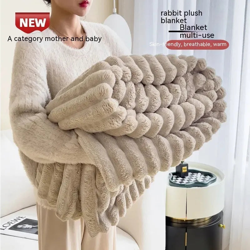 Soft Wind bubble velvet faux rabbit fur blanket in a solid colour, showing its double-sided texture.