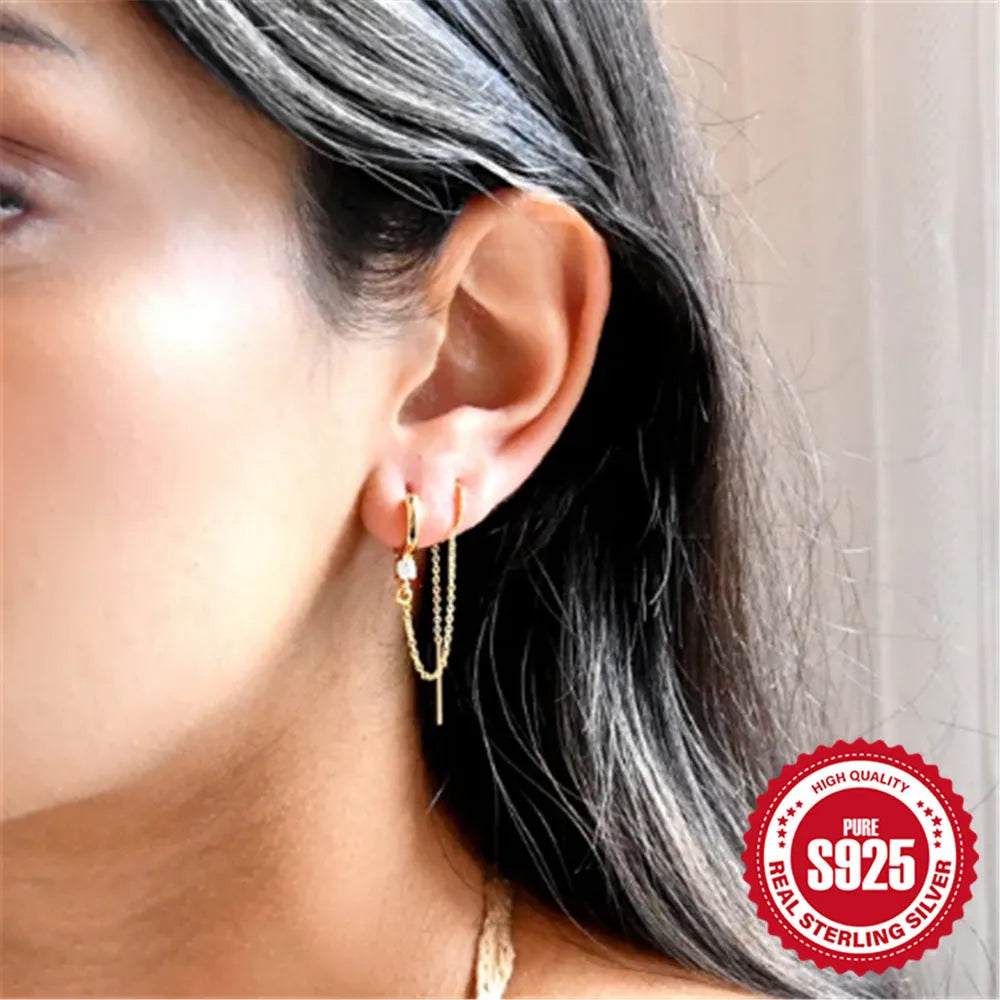 S925 sterling silver geometric ear clip studs with a diamond flower and tassel chain design in a gold electroplated finish.