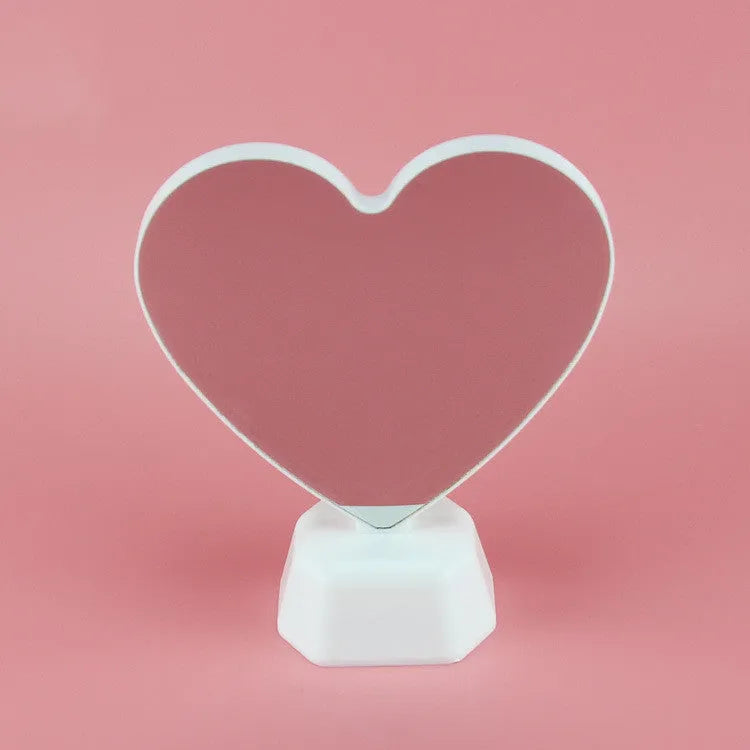 Plastic double-sided LED love tunnel light in rose red or dolphin colour, measuring 16cm long.