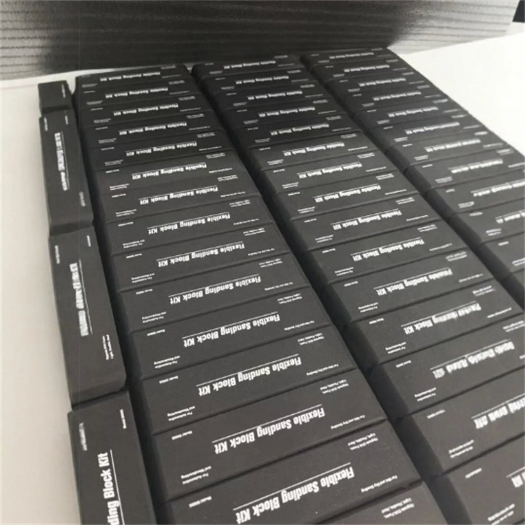 Set of seven black frosted EVA display blocks with metal construction for photography and staging.