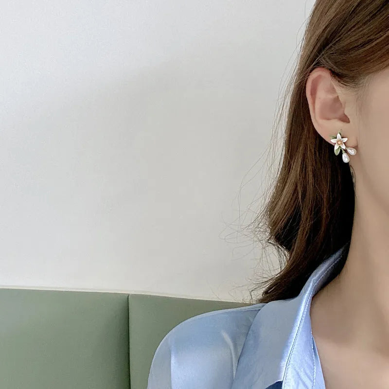 Women's alloy flower earrings with sterling silver needle camellia design and contrast colour styling